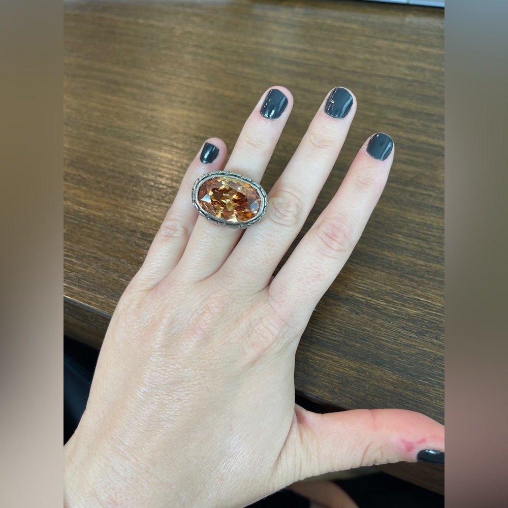 Silver Tone Ring with Orange Stone